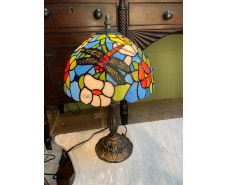 A Tiffany style dragon fly design table lamp. In a working condition. [41cm in height] 