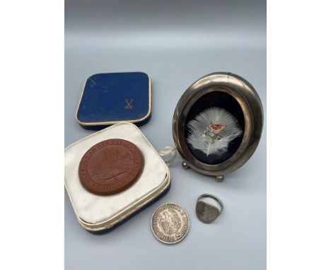 Meissen terracotta plaque with box, 1936 German coin, Silver coin ring and a Wren painted on a white peacock feather framed 