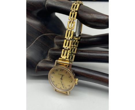 Vintage ladies 9ct gold cased Tissot stylist watch, paired with a rolled gold strap [working] 