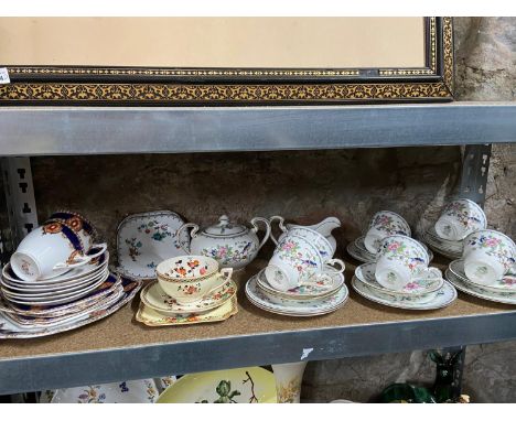 A Shelf of collectable porcelain tea sets which includes Aynsley 'Pembroke' tea set, Kensington Superior part tea set and Cro