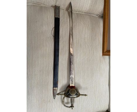 A Vintage Toledo sword and scabbard 