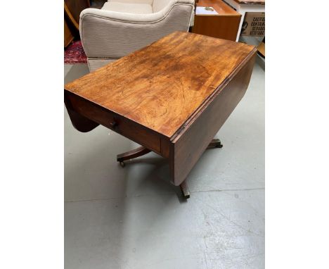 A Georgian sofa table design with drop ends and single under drawer. 