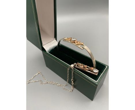 A Silver 925 and rose gold overlay Charles Rennie Mackintosh style bangle and pendant with silver necklace. 