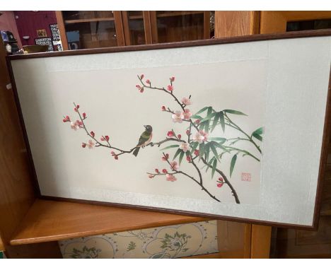 A Japanese silk tapestry of a bird perched on a cherry blossum branch. Signed by the artist. 
