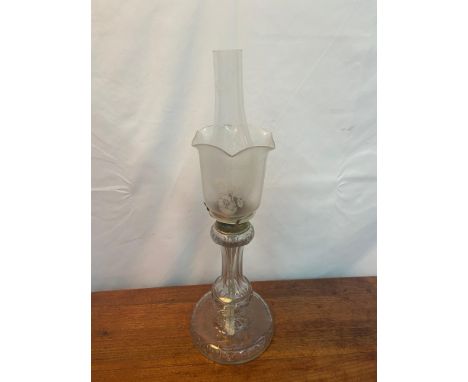 A Victorian cut crystal paraffin lamp set with an etched floral design shade. Comes with burning funnel. [57cm in height] 