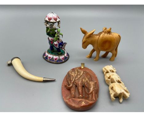 A Lot of far eastern collectables which includes a silver and enamel painted men travelling on an elephant, Ivory carved donk