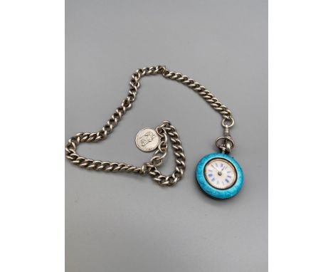 A Gents antique silver Guilloche enamel and seed pearl fob watch together with a heavy silver Albert chain and silver St. Chr