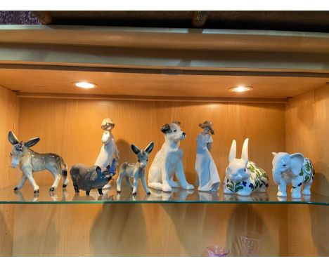 A Lot of collectable porcelain to include Royal Doulton pig, Two Nao figurines and USSR Dog Figure 