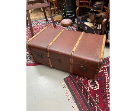 A Vintage wooden bound steamer travel trunk. 