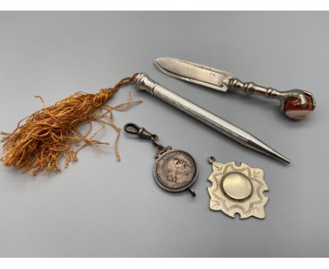 A Sterling silver life-long revolving pencil, Silver 1889 Australian coin fob, White metal fob medal and an agate ball and cl