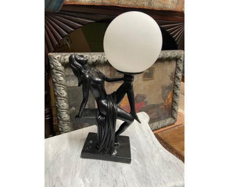 A contemporary nude lady figurine table lamp designed with white globe shade. [38cm height] 