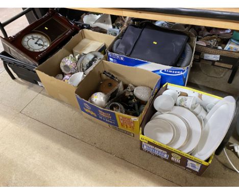 Under table lot comprising of a hoover, a clock and four boxes of china etc