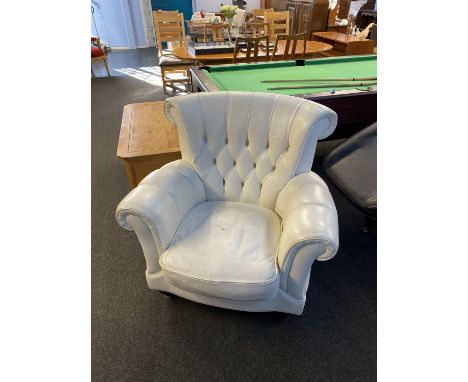 Cream button back armchair