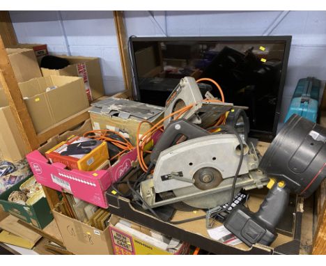 Shelf of tools and a TV