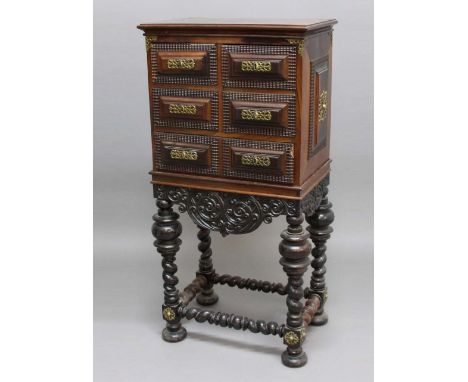 INDO-PORTUGUESE ROSEWOOD CHEST ON STAND, 19th century, the chest with six short, fielded panel drawers on an ebonised base wi