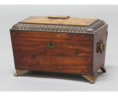 WILLIAM IV ROSEWOOD TEA CADDY, of sarcophagus form, the fitted interior with a pair of lidded canisters and a cut glass mixin