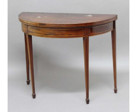 GEORGE III MAHOGANY DEMI-LUNE CARD TABLE, with a cross banded top and box wood line inlay, height 76cm, width 96cm