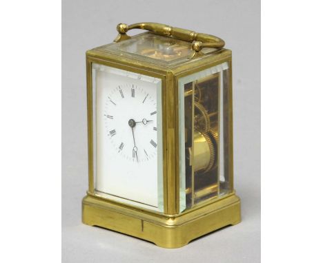 FRENCH FOUR PANE CARRIAGE CLOCK,  late 19th century, the enamelled dial on a brass, eight day movement half hourly striking t