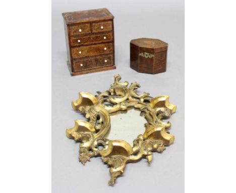 'CHINESE CHIPPENDALE' ROCOCO STYLE WALL MIRROR, height 50cm; together with a walnut miniature chest of drawers and an octagon