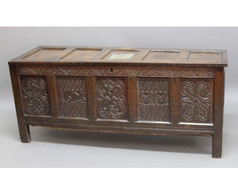 OAK FIVE PANEL COFFER, perhaps late 17th century, the cover with strap hinges enclosing a vacant interior, above a front with