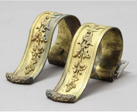 PAIR OF FRENCH ORMOLU CURTAIN TIE BACKS, of scrolled form, with harebell and grape applied decoration, length 20cm, width 6.2