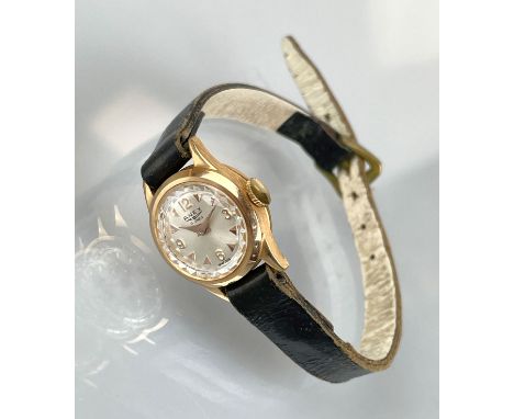 Damenarmbanduhr "Amex" 750 Roségold (Schweiz).Zifferblatt mit Lünette ca. 15 mm Durchmesser. Handaufzug. Perlmutt-Zifferblatt