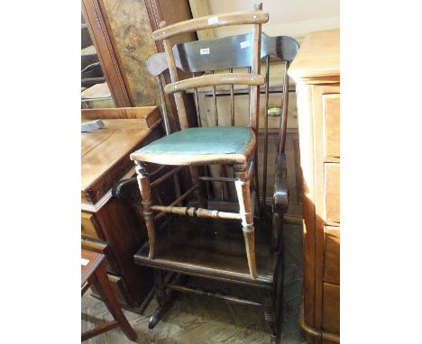 A stick back rocking chair, one other and a TV table