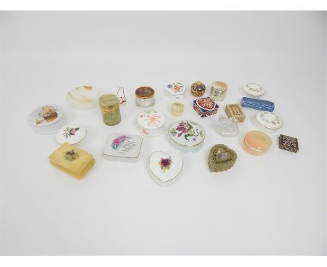 A large collection of trinket boxes to include porcelain examples by Wedgwood, Coalport Wade and others with hard-stone examp