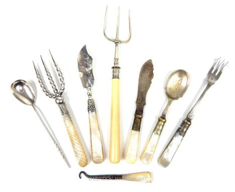 A Victorian silver butter knife, Edwardian silver bread fork and George V silver preserve spoon and four other Victorian plat