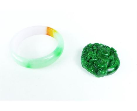 A Chinese multi-coloured jade bangle with beautiful colouration of green to lavender to orange (Dia: 7 cm) with a green, circ