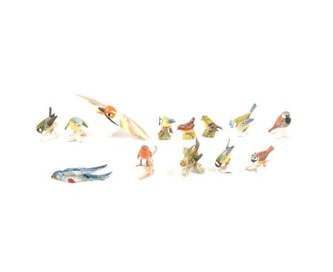 Collection of thirteen bird figurines, various makers, including stylised bird signed Selim for Goebel, seven Goebel garden b