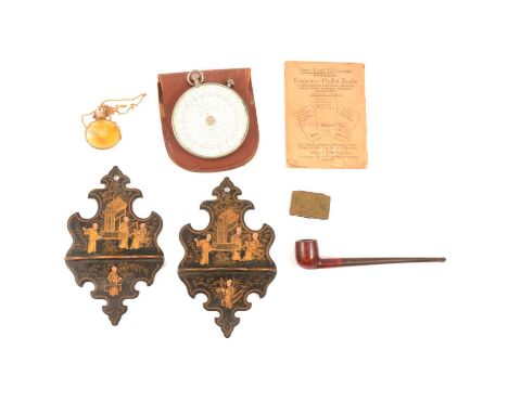 A pair of chinoiserie papier mache wall bracket pipe holders 18x11cm and a pipe; Queen Victoria stamp case Reg'd Aug. 7th 187