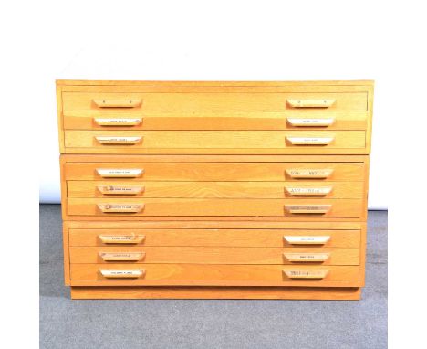 Light oak nine drawer plan chest, in three sections, plinth base, width 116cm, depth 80cm, height 89cm.Condition report:The c