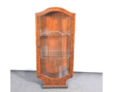 1930's walnut china cabinet, arched top, glazed door, plinth base, width 57cm, depth 30cm, height 127cm.