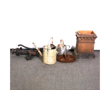 Terracotta chimney pot, vintage water pump, cast iron boot scraper and two watering cans, (5).