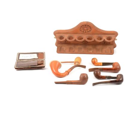 Calabash pipe; Briar wood pipes, etc, and a pipe rack.