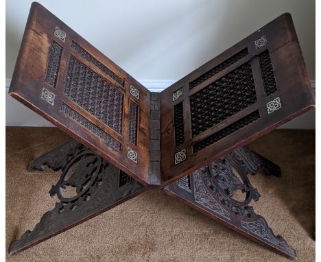 A Middle Eastern prayer book stand, fretwork panels and inlaid with mother of pearl