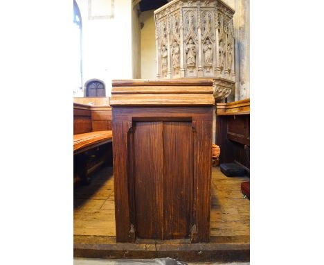A Victorian pine pew with doubled paneled back and prayer book shelf to the reverse, 83cm high, 177cm wide, 47.5cm deepPlease