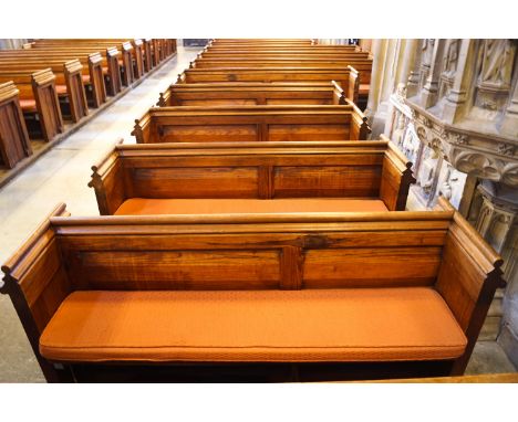 A Victorian pine pew with doubled paneled back and prayer book shelf to the reverse, 83cm high, 177cm wide, 47.5cm deepPlease