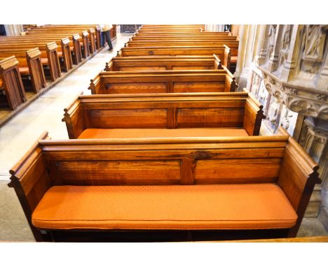 A Victorian pine pew with double paneled back and prayer book shelf to the reverse 83cm high, 212cm wide, 47cm deepPlease Not