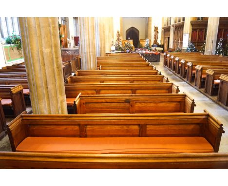 A Victorian pine pew with triple paneled back and prayer book shelf to the reverse 83cm high, 278cm wide, 47.5cm deepPlease N