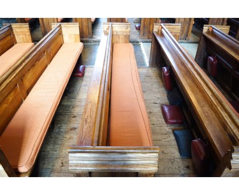  A Victorian pine pew with triple paneled back and prayer book shelf to the reverse 83cm high, 278cm wide, 48cm deepPlease No