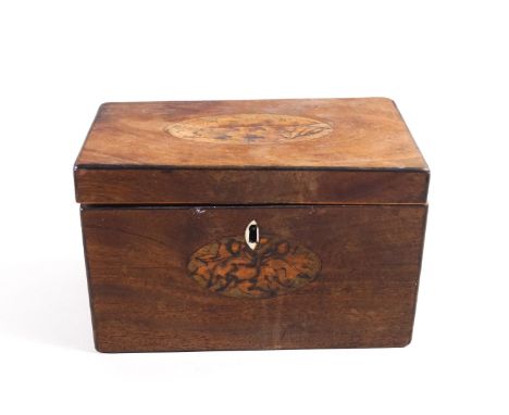 A mahogany rectangular form two compartment tea caddy, the top and front inlaid with shell motifs, 12cm high x 19cm wide x 11