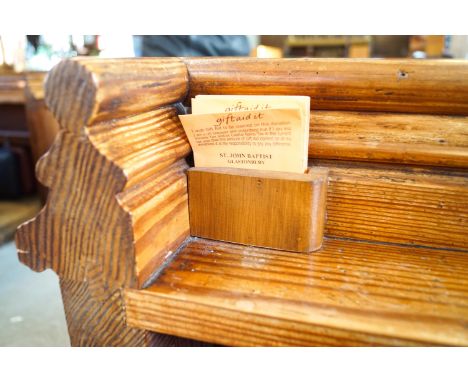 A Victorian pine pew with triple paneled back and prayer book shelf to the reverse 83cm high, 278cm wide, 47.5cm deepPlease N