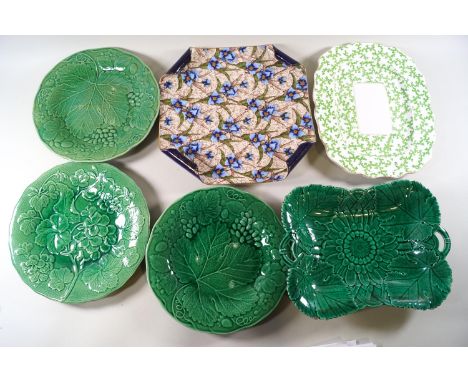 A Victorian aesthetic plate of squared form with rolled corners, high enamel decorated with orchids and other ceramics