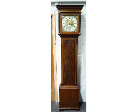 A mahogany long case clock with eight day movement by Adam Cleak of Bridport, the brass dial with engraving and applied spand