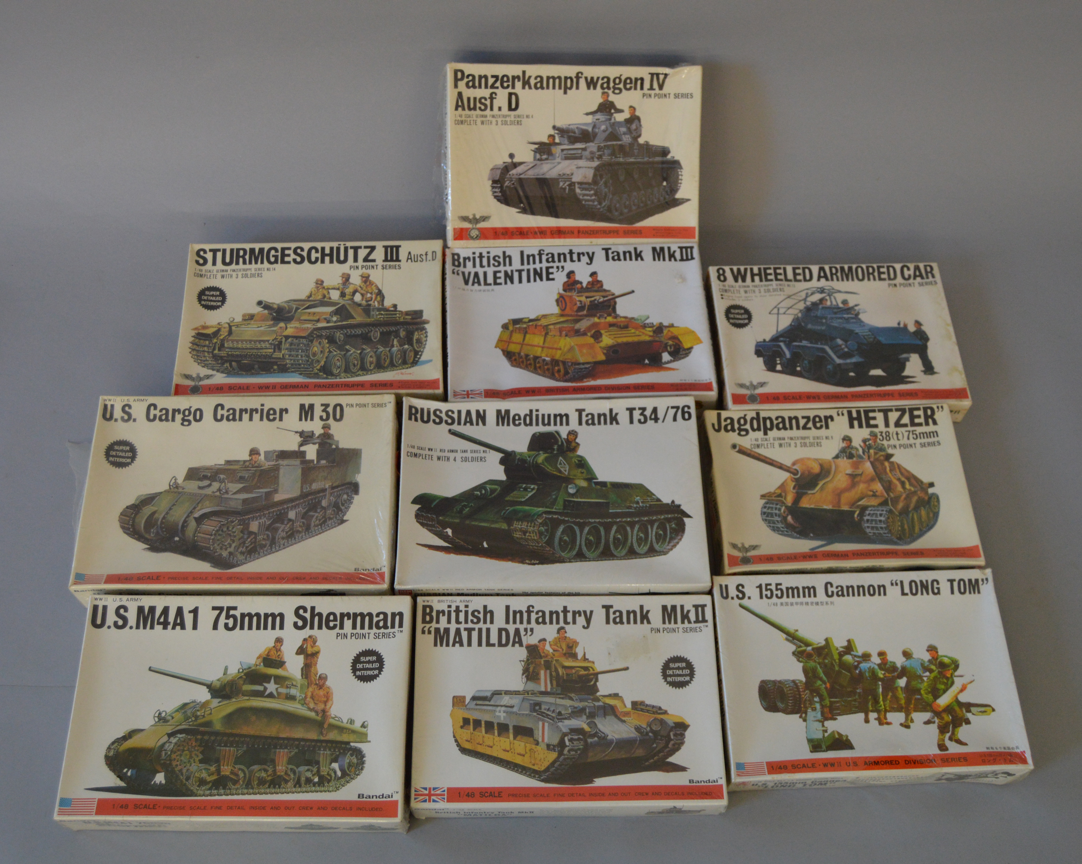 10 x Bandai 148 scale military related model kits. All sealed.