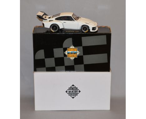 A boxed 1:18 scale Exoto diecast model Porsche 935, in white, appears VG in VG box.