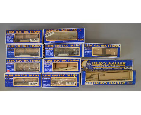 O Gauge. K Lines. 9 x Desert Storm assorted military rolling stock, together with diecast heavy hauler truck. G/VG boxed. One