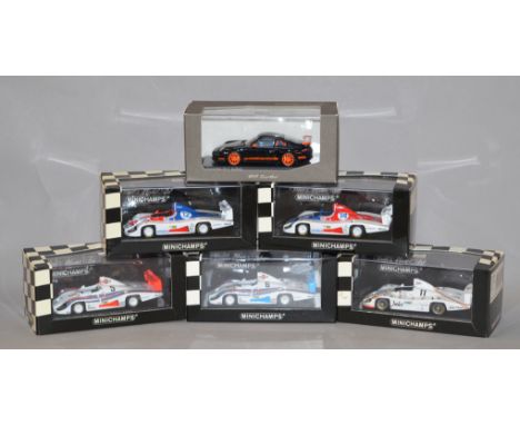 Six boxed Minichamps Porsche diecast model race cars in 1:43 scale, includes five 936 Martini cars and one 911 RSR. Models ap